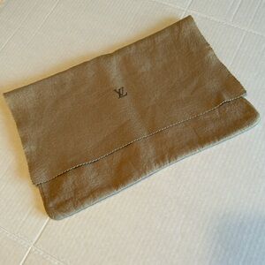 Louis Vuitton small dust bag.